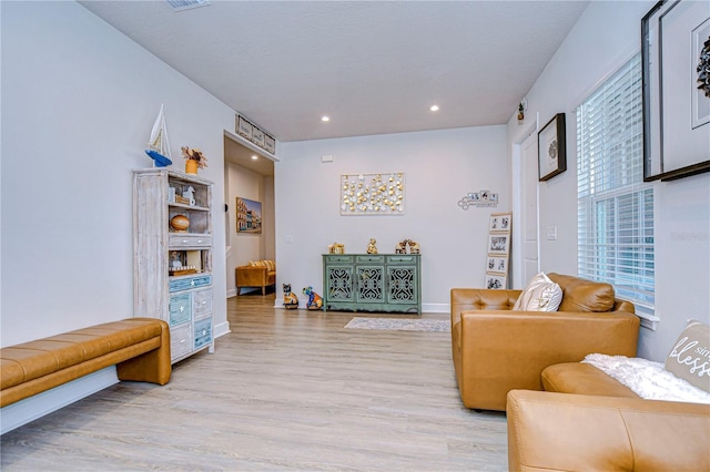 living area featuring light hardwood / wood-style flooring