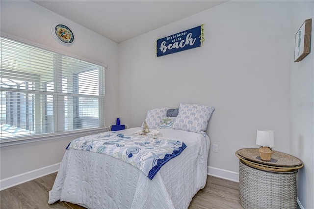 bedroom featuring hardwood / wood-style floors