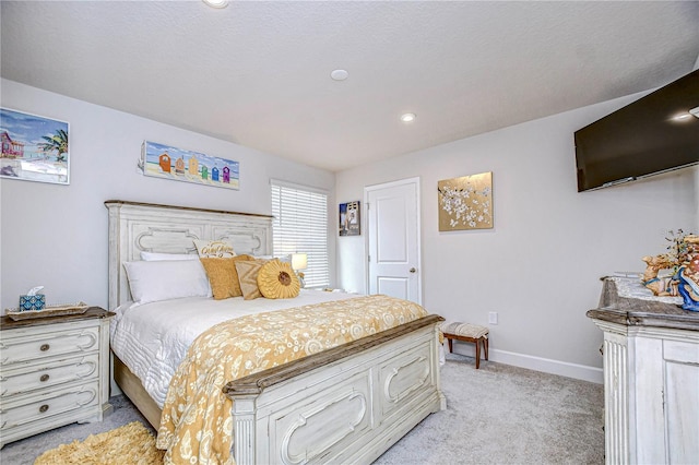 bedroom featuring light colored carpet