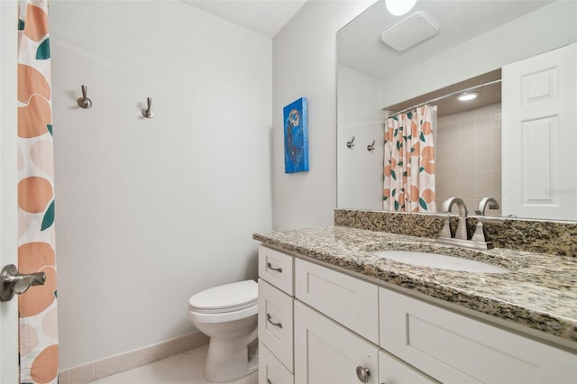 bathroom featuring tile patterned floors, vanity, toilet, and curtained shower