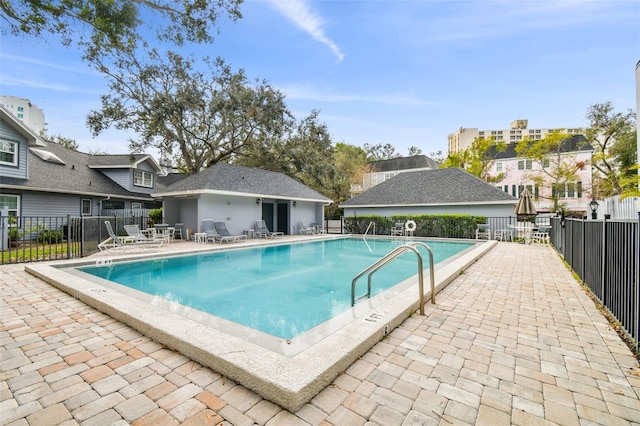 view of swimming pool featuring a patio