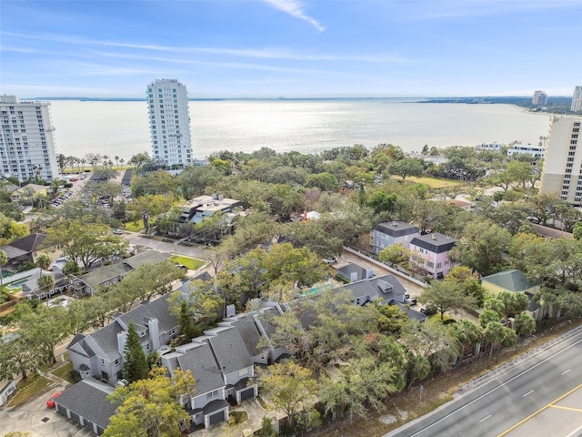 birds eye view of property featuring a water view