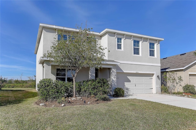 view of front of home featuring a garage and a front yard