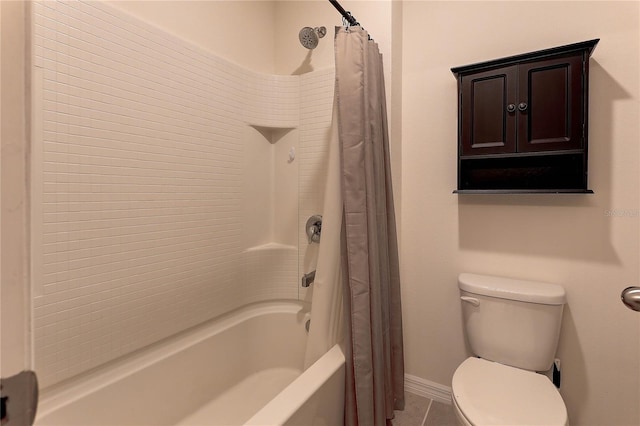 bathroom with tile patterned floors, shower / bath combination with curtain, and toilet