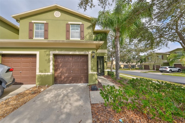 view of front of property featuring a garage