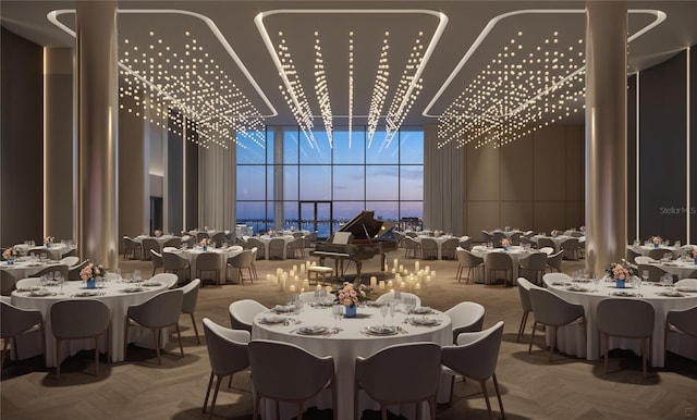 dining space featuring parquet floors and a high ceiling