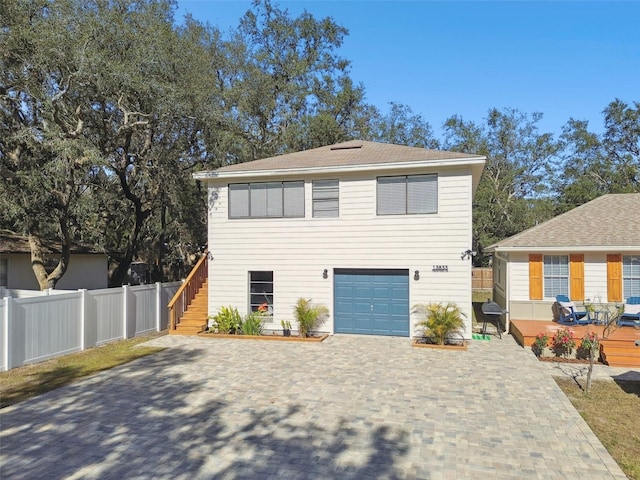 view of front of home with a garage