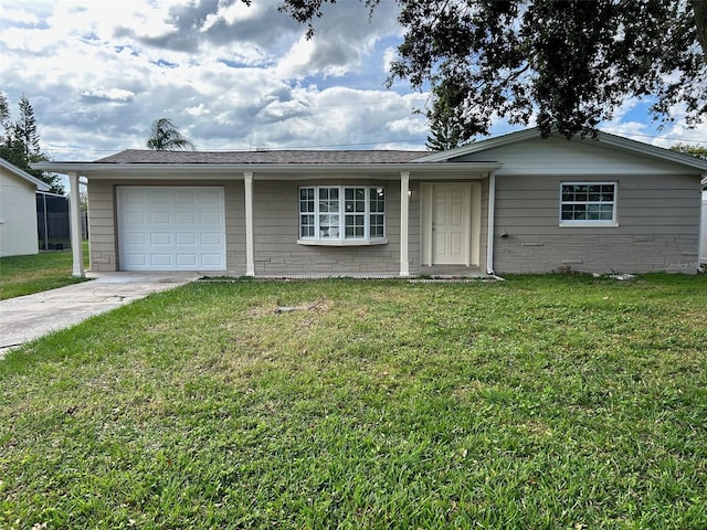 single story home featuring a garage and a front yard