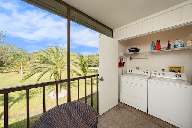 laundry area with plenty of natural light, light carpet, and independent washer and dryer