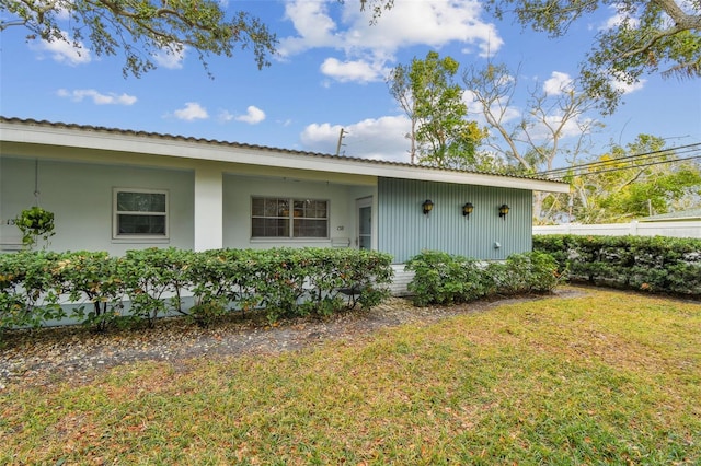 exterior space with a lawn