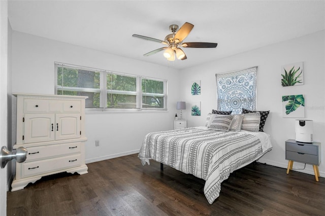 bedroom with dark wood-type flooring and ceiling fan