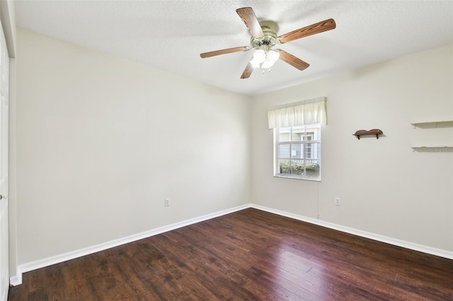 spare room featuring hardwood / wood-style floors, a textured ceiling, and ceiling fan