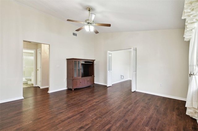 unfurnished living room with ceiling fan, dark hardwood / wood-style flooring, and high vaulted ceiling