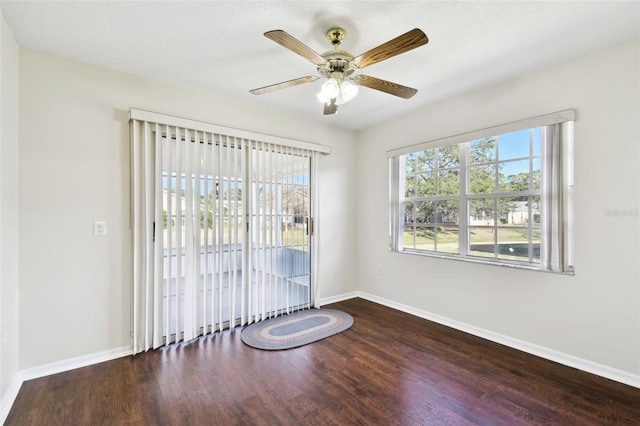 spare room featuring ceiling fan and hardwood / wood-style floors