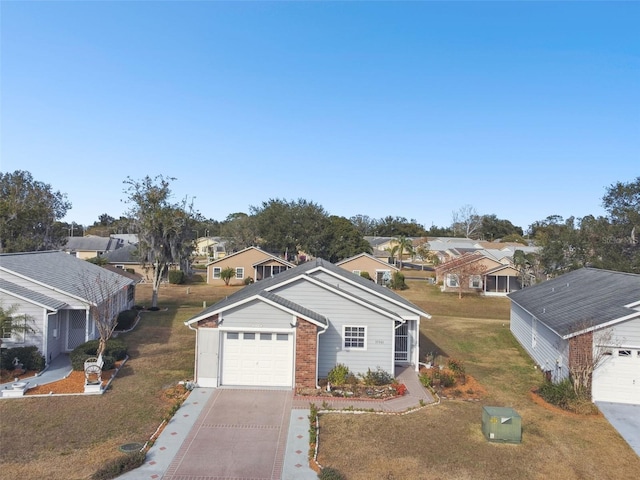 view of front facade with a garage and a front yard