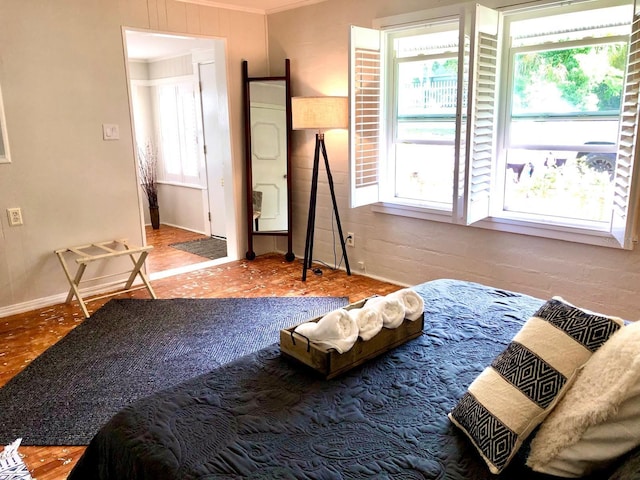 bedroom with ornamental molding