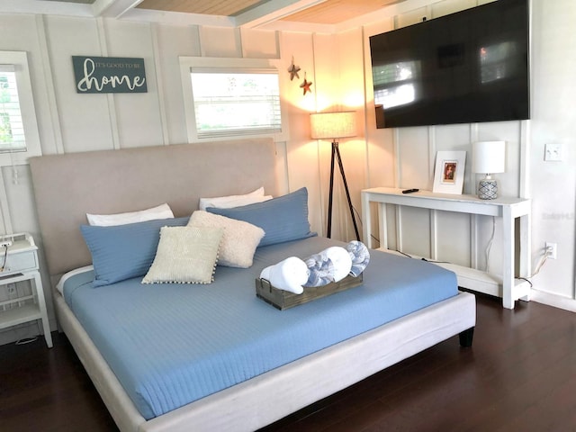 bedroom featuring dark wood-type flooring