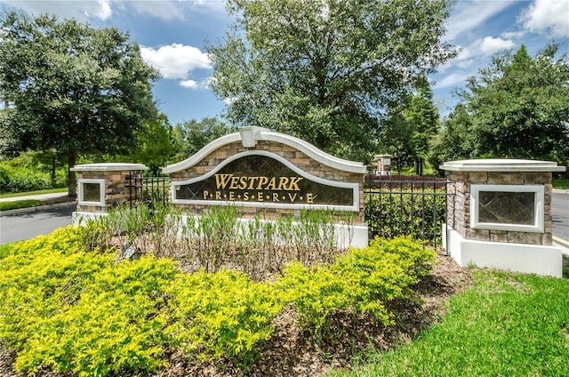 view of community sign