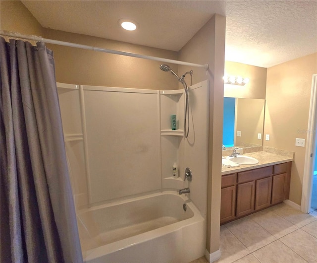 bathroom featuring a textured ceiling, tile patterned flooring, vanity, baseboards, and shower / bathtub combination with curtain