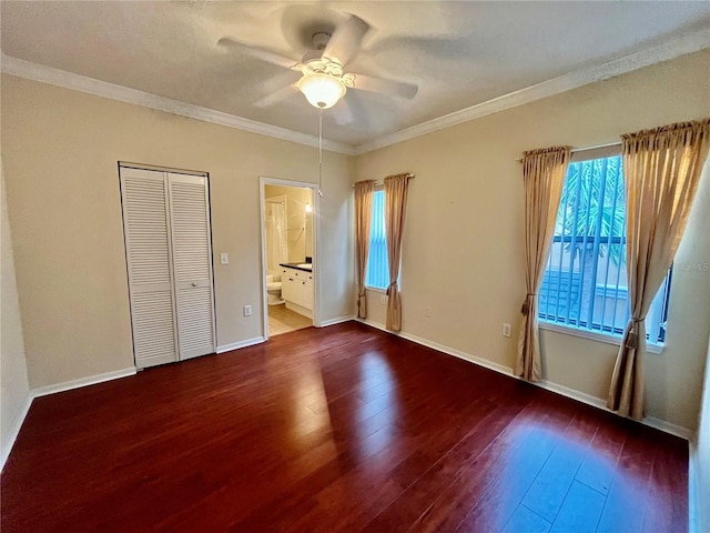 2254 Chianti Pl Unit 68, Palm Harbor, FL 34683 - unfurnished bedroom featuring hardwood / wood-style flooring, ornamental molding, baseboards, ceiling fan, and connected bathroom
