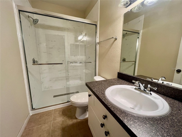 2254 Chianti Pl Unit 68, Palm Harbor, FL 34683 - bathroom with toilet, vanity, a shower stall, and tile patterned flooring