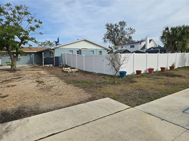 view of yard with a garage