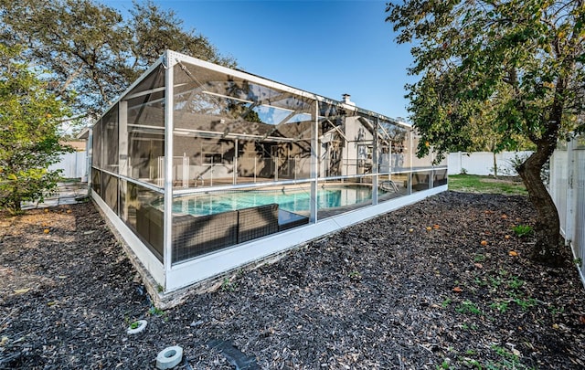 view of pool featuring a lanai