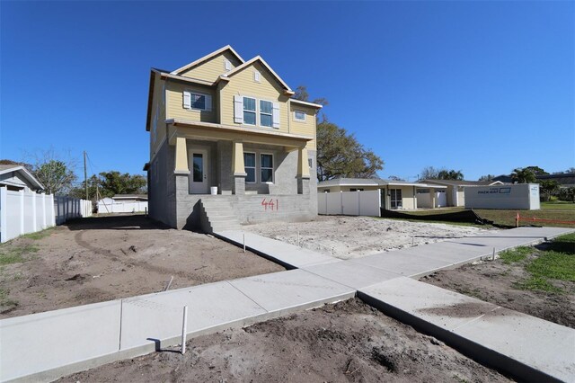 view of front of home with fence