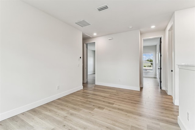 441 42nd Ave NE, Saint Petersburg, FL 33703 - unfurnished room with light wood-style floors and recessed lighting