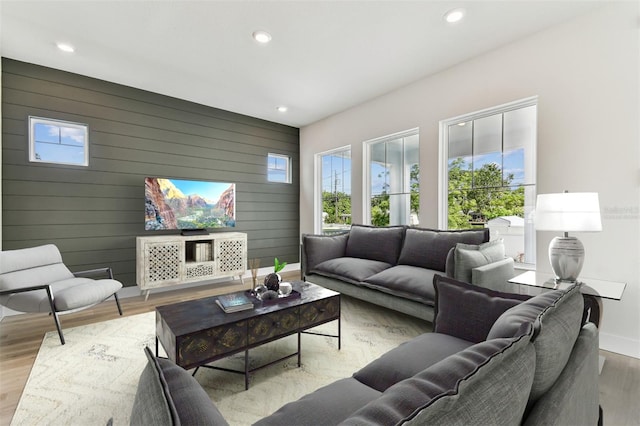 441 42nd Ave NE, Saint Petersburg, FL 33703 - living area with recessed lighting, wood finished floors, and wooden walls