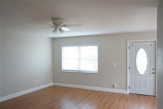 entrance foyer with ceiling fan, light hardwood / wood-style floors, and a healthy amount of sunlight