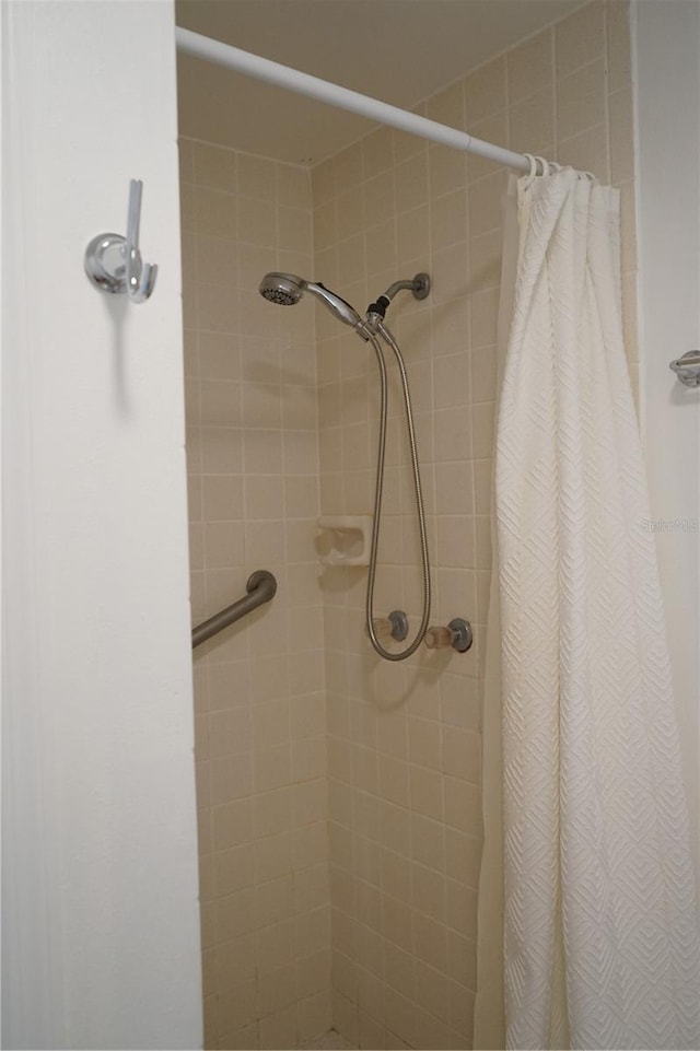 bathroom with a shower with curtain