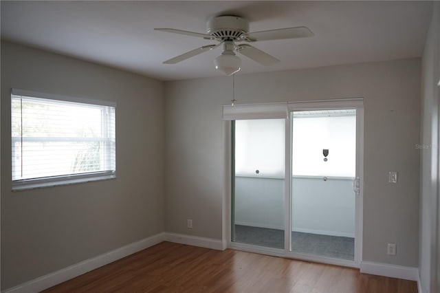 empty room featuring light hardwood / wood-style floors and ceiling fan