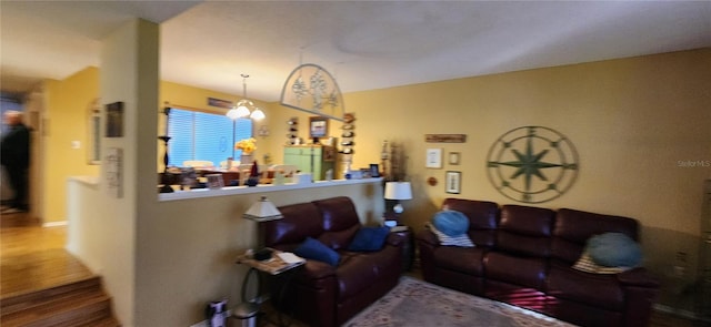 living room with a chandelier