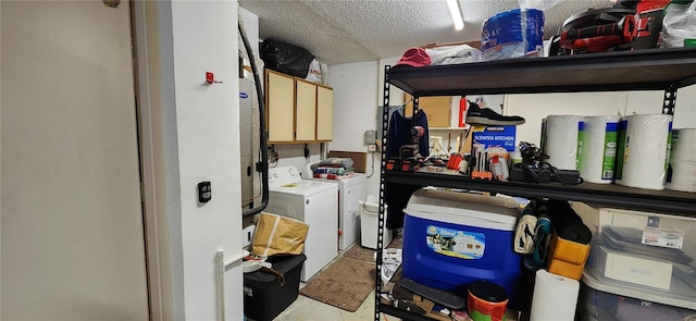 storage area with washing machine and dryer