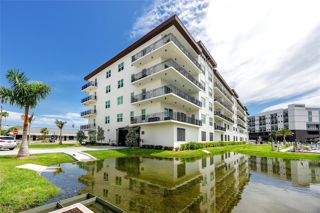 view of building exterior featuring a water view