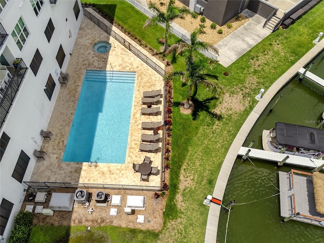 birds eye view of property featuring a water view