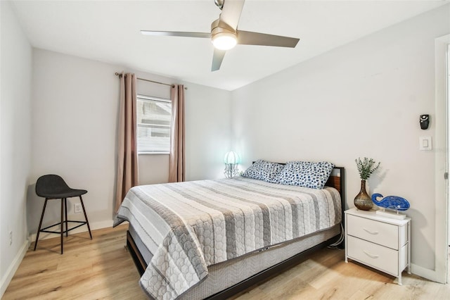 bedroom featuring ceiling fan and light wood-type flooring