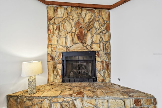 room details featuring a stone fireplace