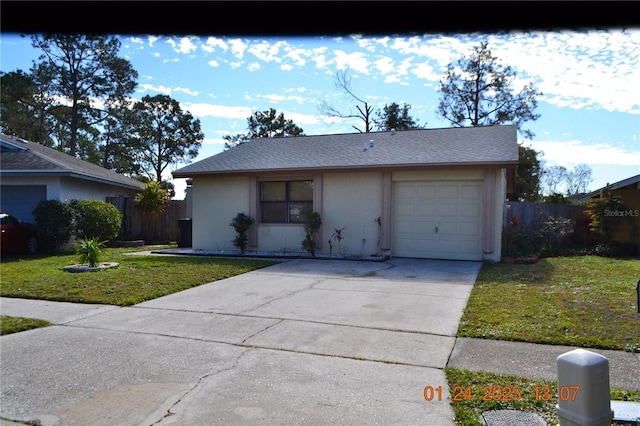 ranch-style house with a garage and a front yard