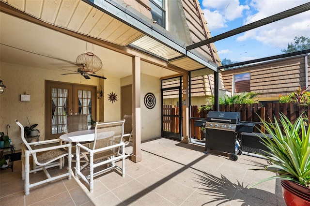 view of patio with grilling area and ceiling fan