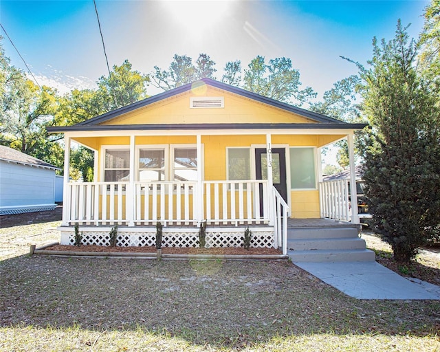 bungalow-style house with a porch