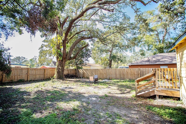 view of yard with a deck