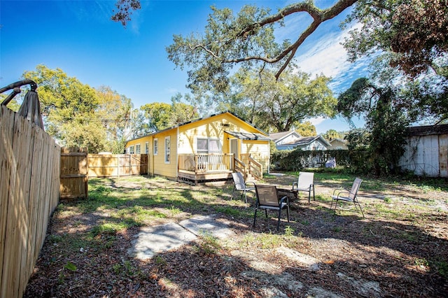 view of yard featuring a wooden deck