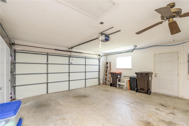 garage featuring ceiling fan and a garage door opener