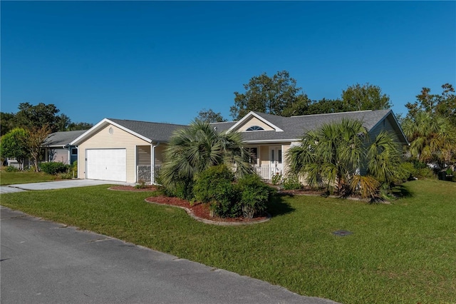 ranch-style house with a garage and a front yard