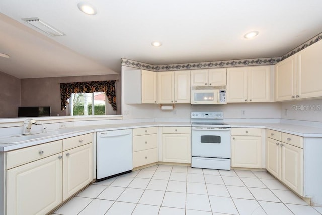 kitchen with white appliances and sink