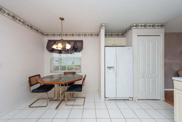 dining space featuring an inviting chandelier