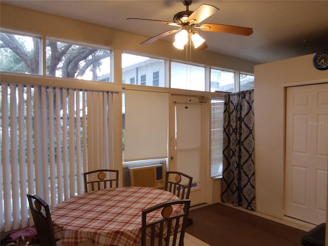 dining room featuring cooling unit and ceiling fan