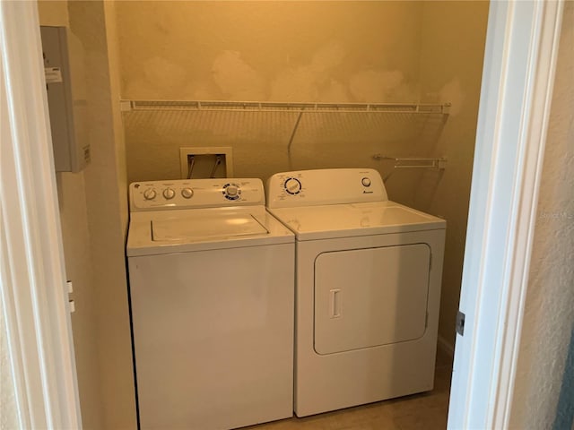 laundry area featuring separate washer and dryer